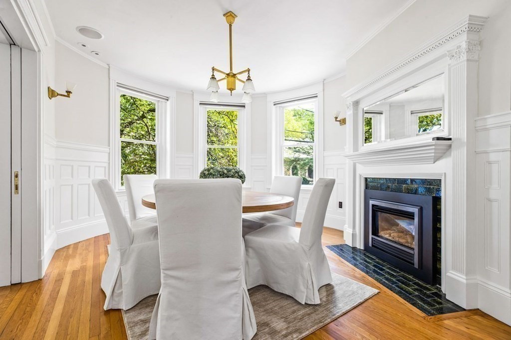 1 Clinton Path, Unit 2 Brookline, MA 02445 - Photo 9 of 28 a view of a dining room with furniture window and outside view