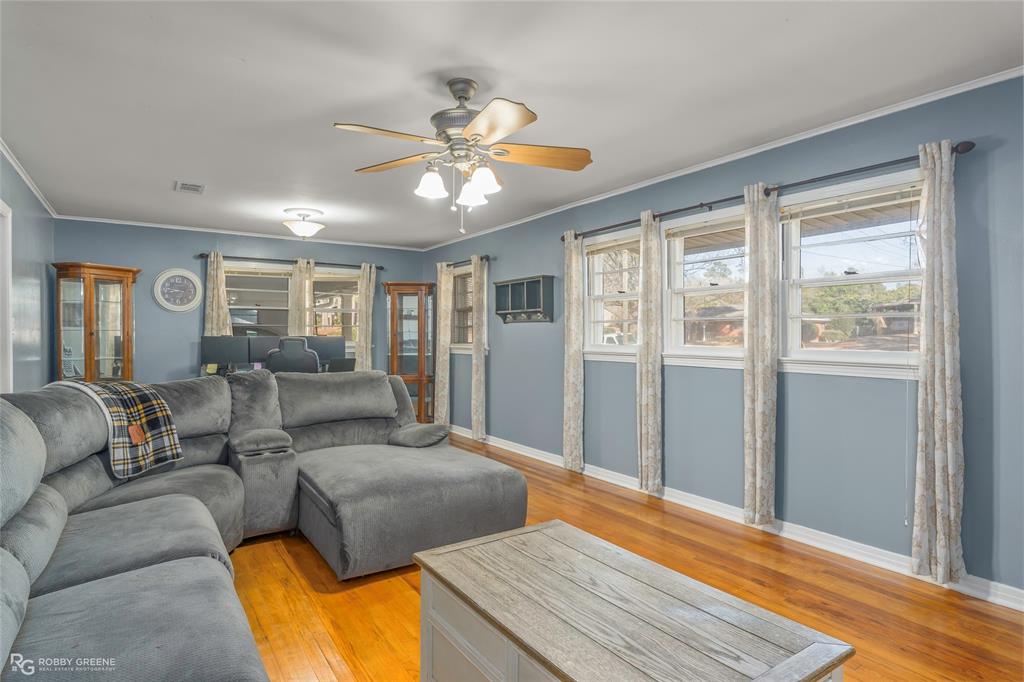 803 Drew Lane Minden, LA 71055 - Photo 6 of 33 a living room with furniture and a large window