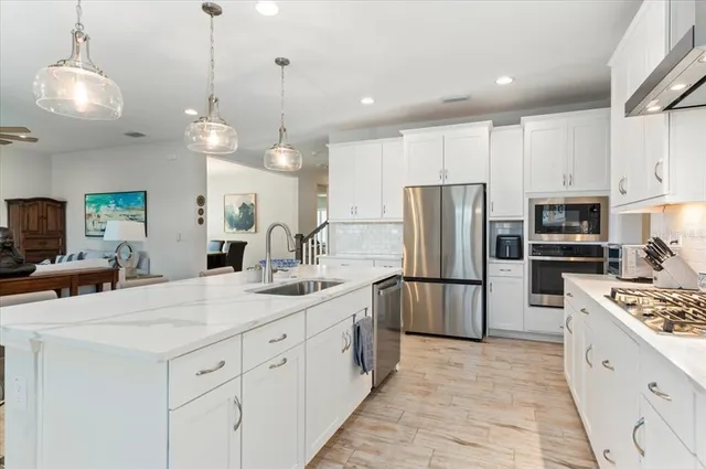 a bedroom with two beds and a window