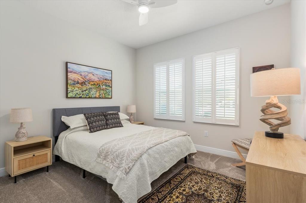 7440 Rhubarb Drive Parrish, FL 34219 - Photo 21 of 59 a bedroom with bed and a window