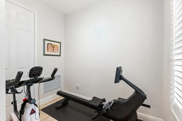 an aerial view of residential houses and outdoor space