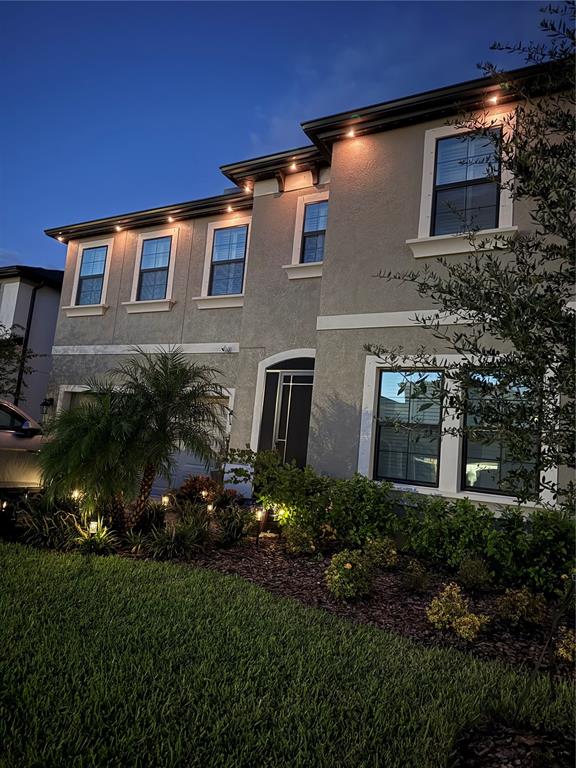 7440 Rhubarb Drive Parrish, FL 34219 - Photo 47 of 59 a front view of a house with a yard