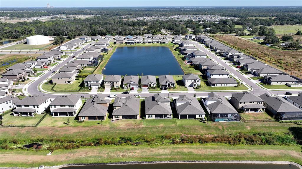 7440 Rhubarb Drive Parrish, FL 34219 - Photo 58 of 59 an aerial view of residential houses and outdoor space