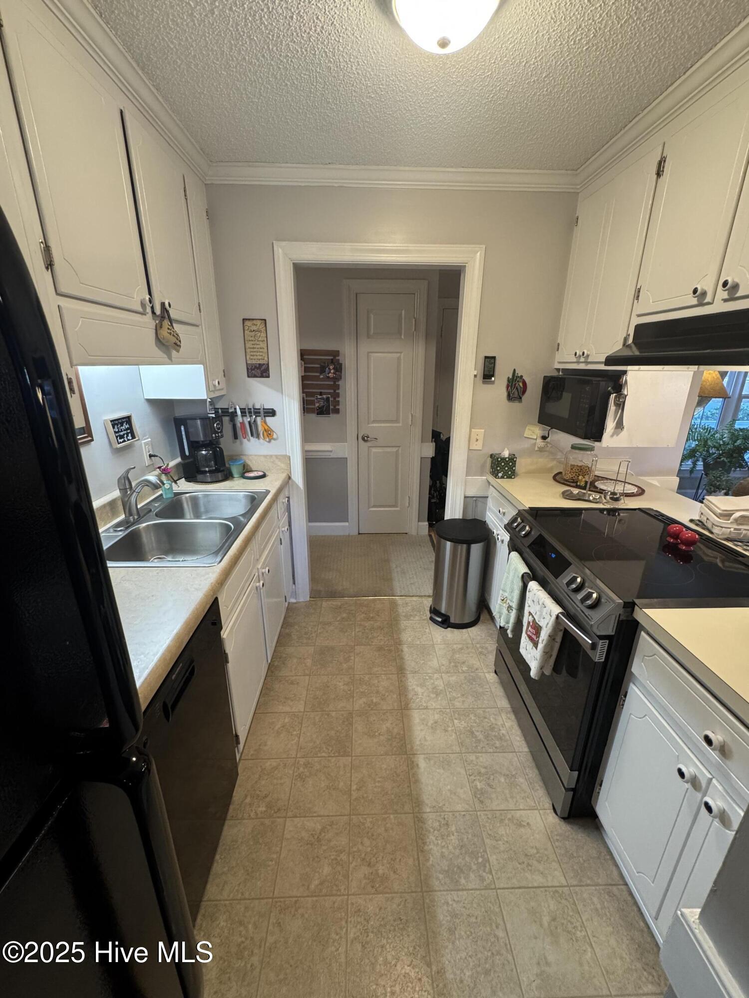 2834 Springflower Drive North Wilson, NC 27896 - Photo 13 of 24 Galley Kitchen