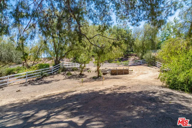 a view of backyard with green space