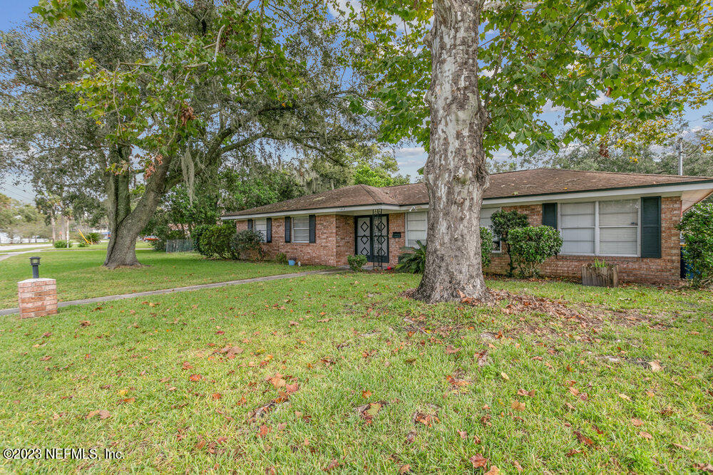 1807 Mill Creek Road Jacksonville, FL 32277 - Photo 2 of 18 a view of house with backyard