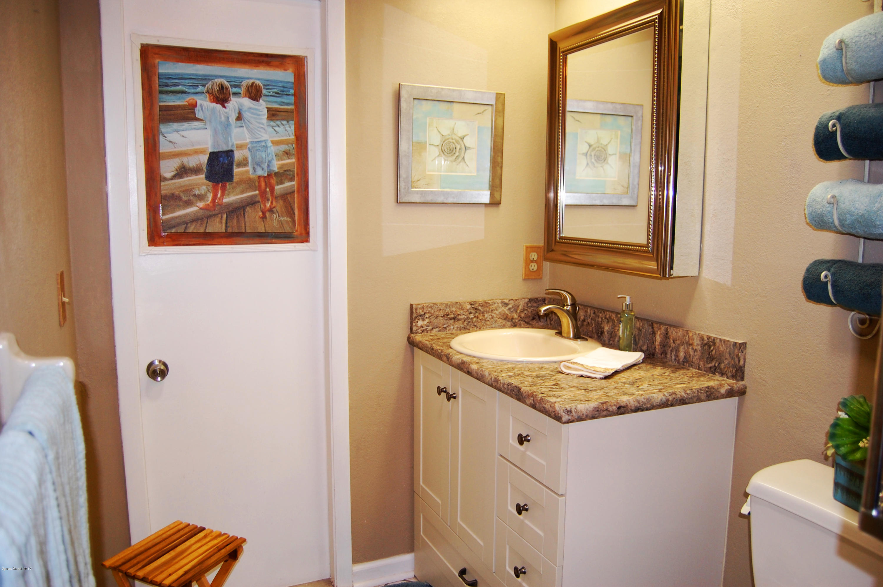 3492 Echo Ridge Place Cocoa, FL 32926 - Photo 15 of 24 Guest bath with Porch Door