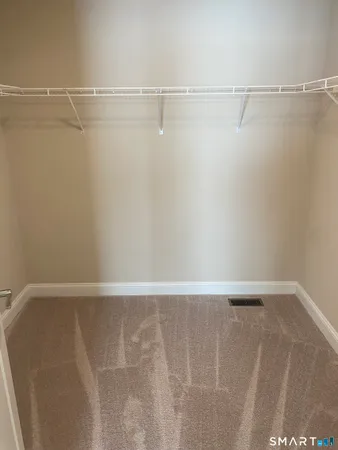 a view of a room with racks on the wall