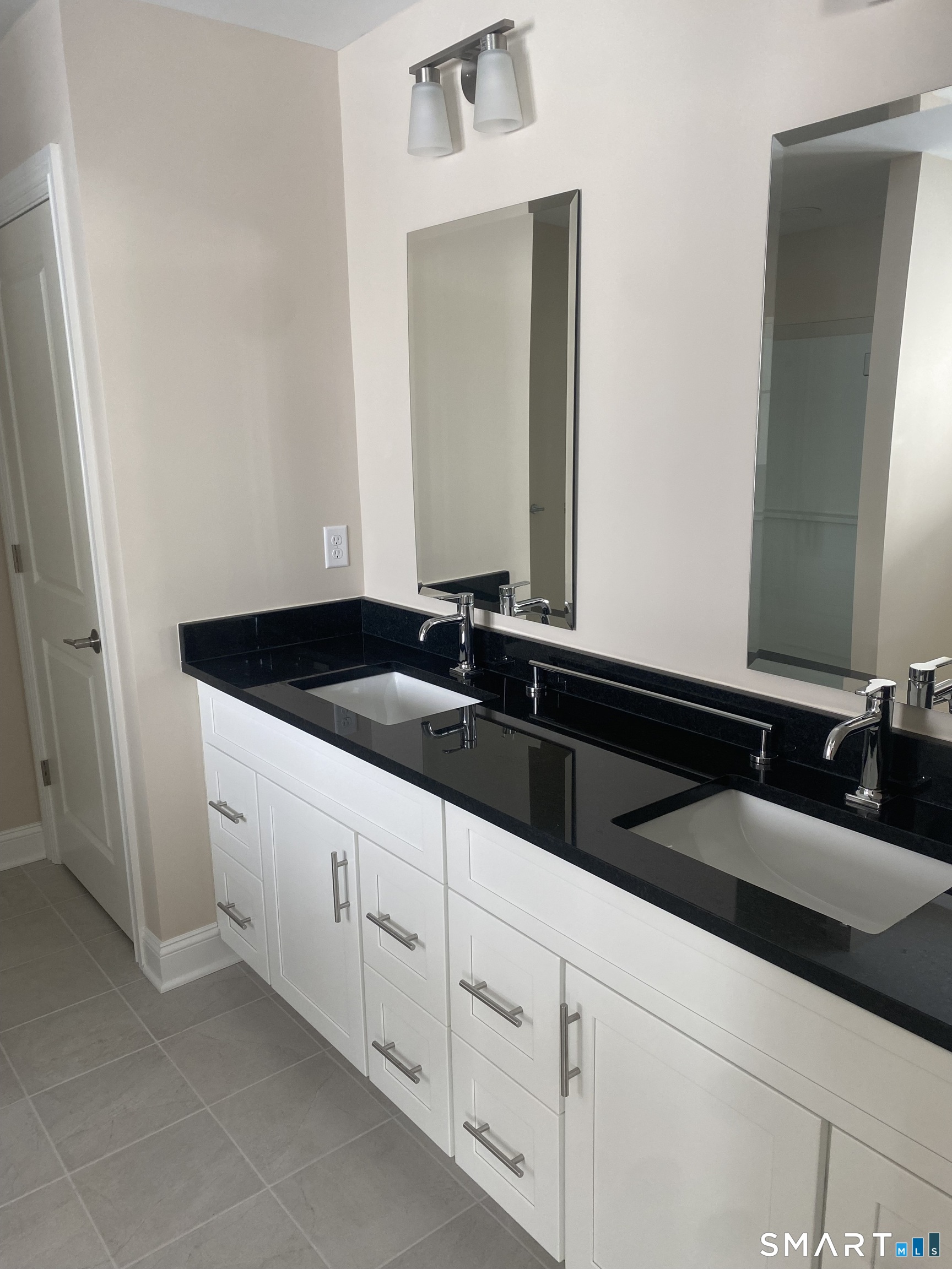 919 Strongtown Road Southbury, CT 06488 - Photo 17 of 40 Double sinks in master bathroom.