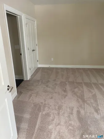 an empty room with a door