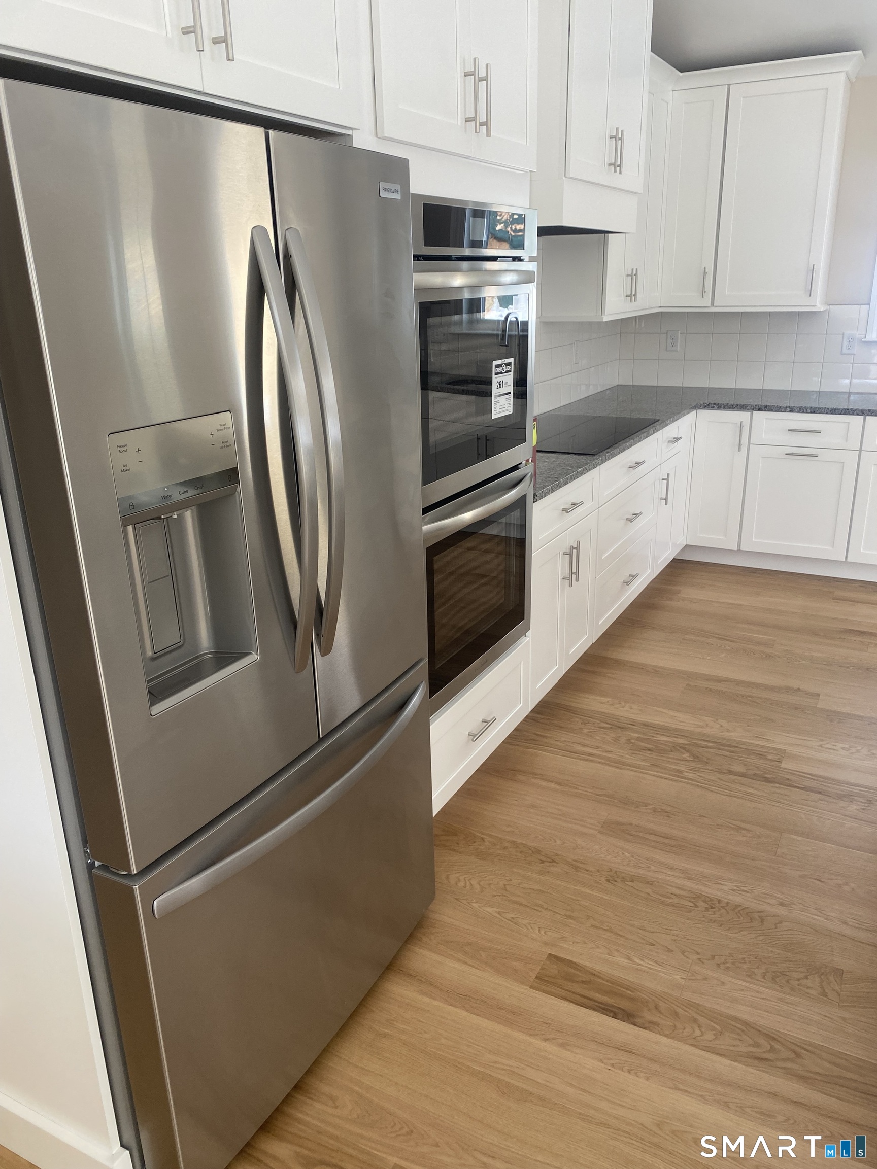 919 Strongtown Road Southbury, CT 06488 - Photo 8 of 40 Stainless steel refrigerator with ice maker and water dispenser.