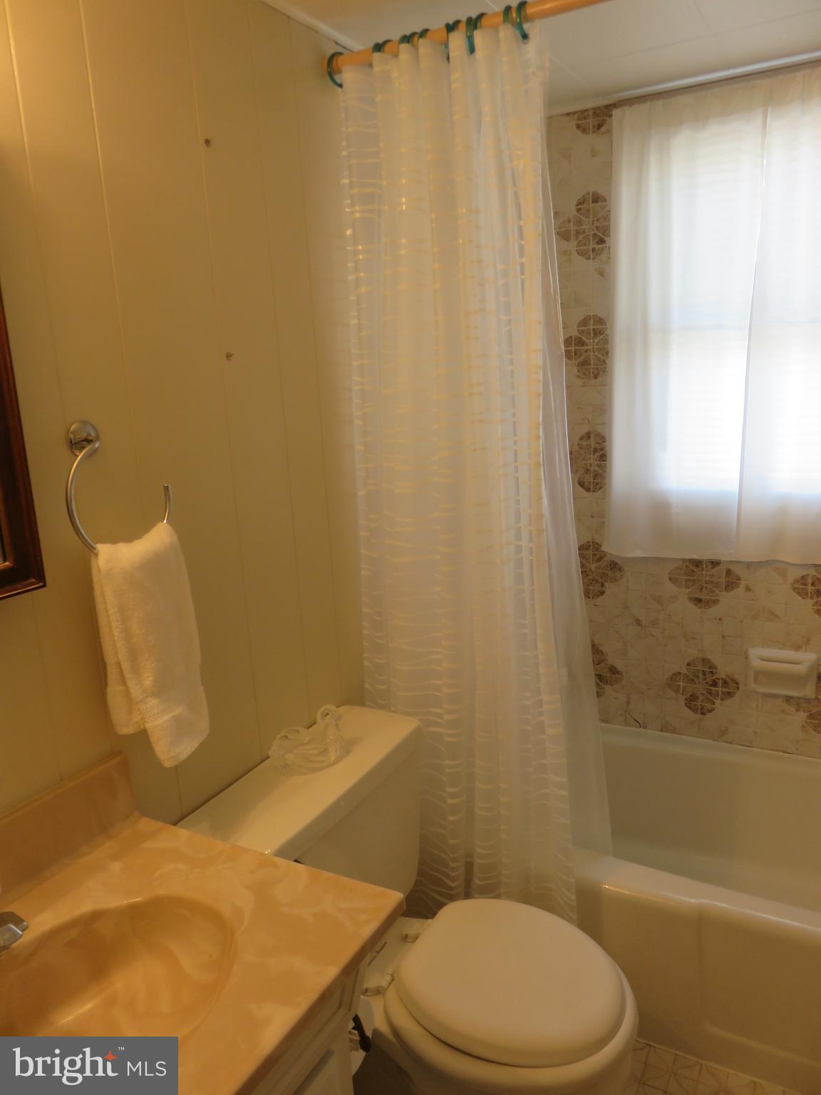 1710 Orlando Road Baltimore, MD 21234 - Photo 17 of 32 a bathroom with a sink and a toilet
