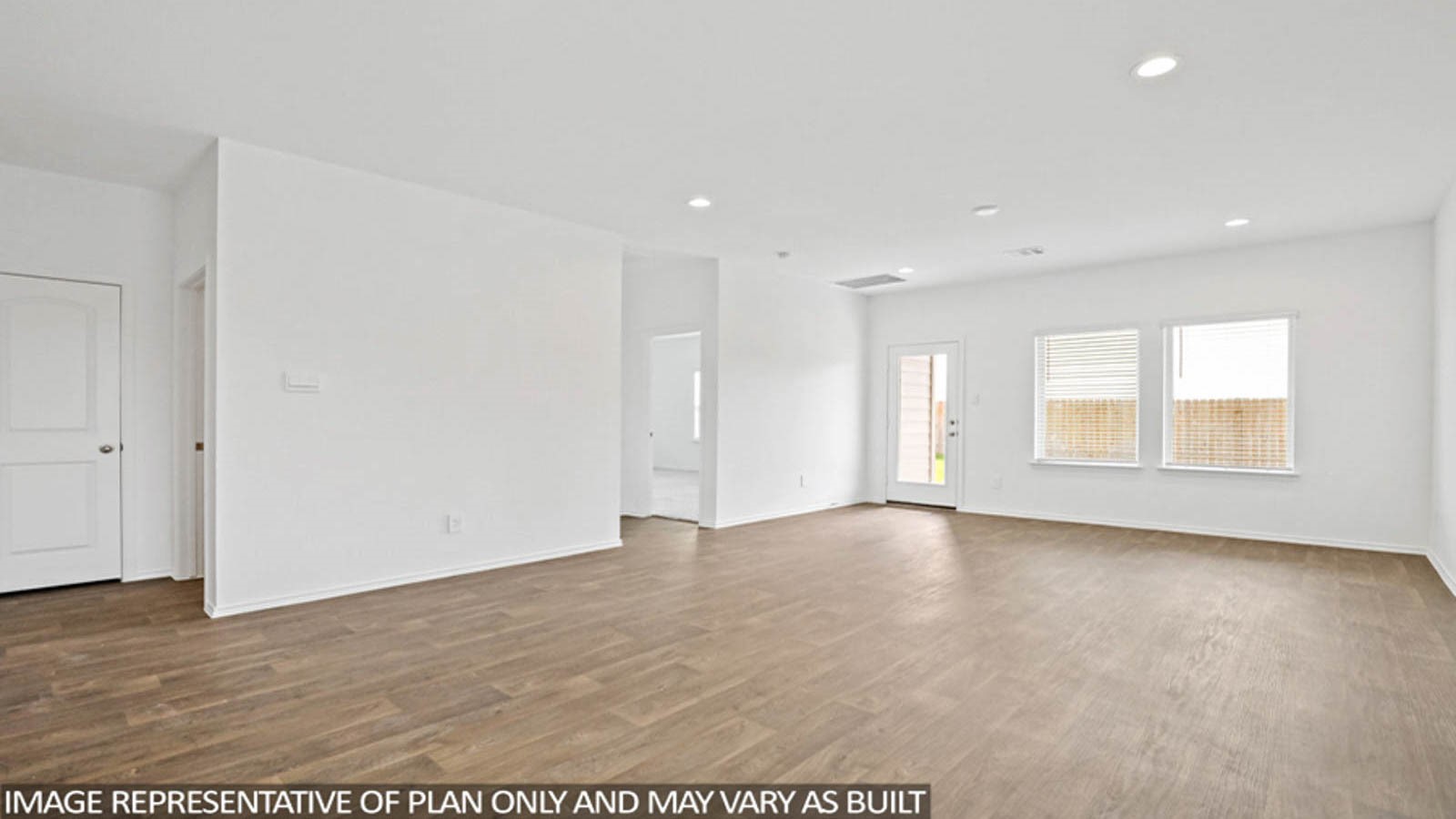 23780 Patchouli Terrace Drive Splendora, TX 77372 - Photo 6 of 25 a view of an empty room with wooden floor and a window