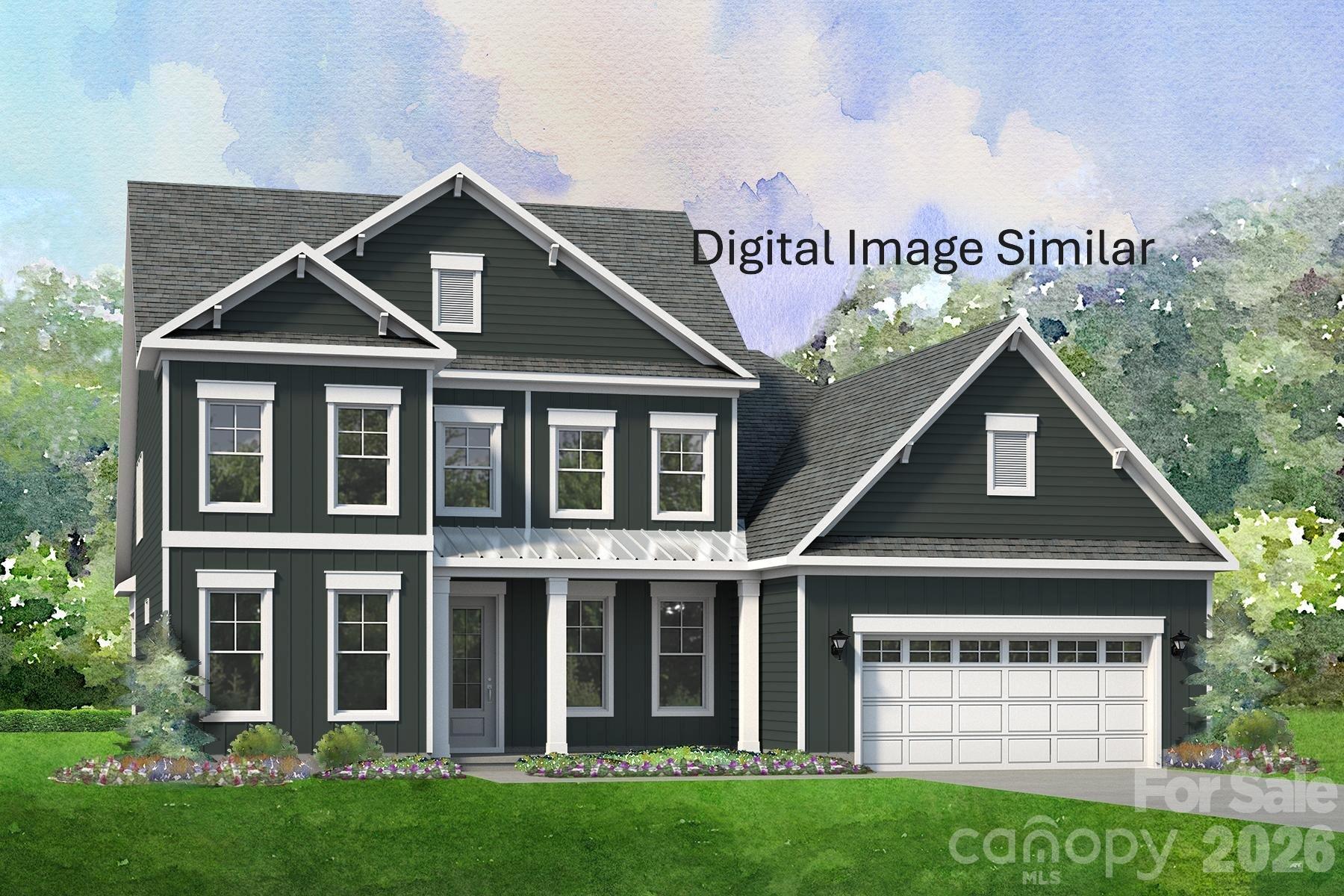 906 Pickney Street, Unit 56 Mount Pleasant, NC 28124 - Photo 1 of 1 a front view of a house with a yard