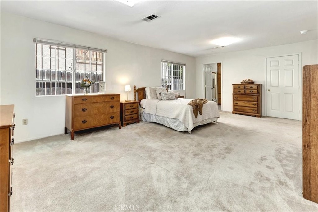 4133 North Mission Road Los Angeles, CA 90032 - Photo 16 of 40 a room with furniture and a dresser