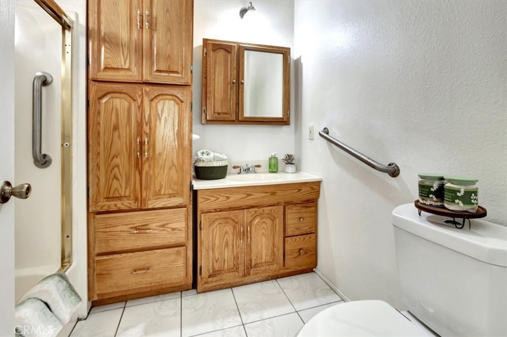 4133 North Mission Road Los Angeles, CA 90032 - Photo 17 of 40 a bathroom with a sink a toilet and shower