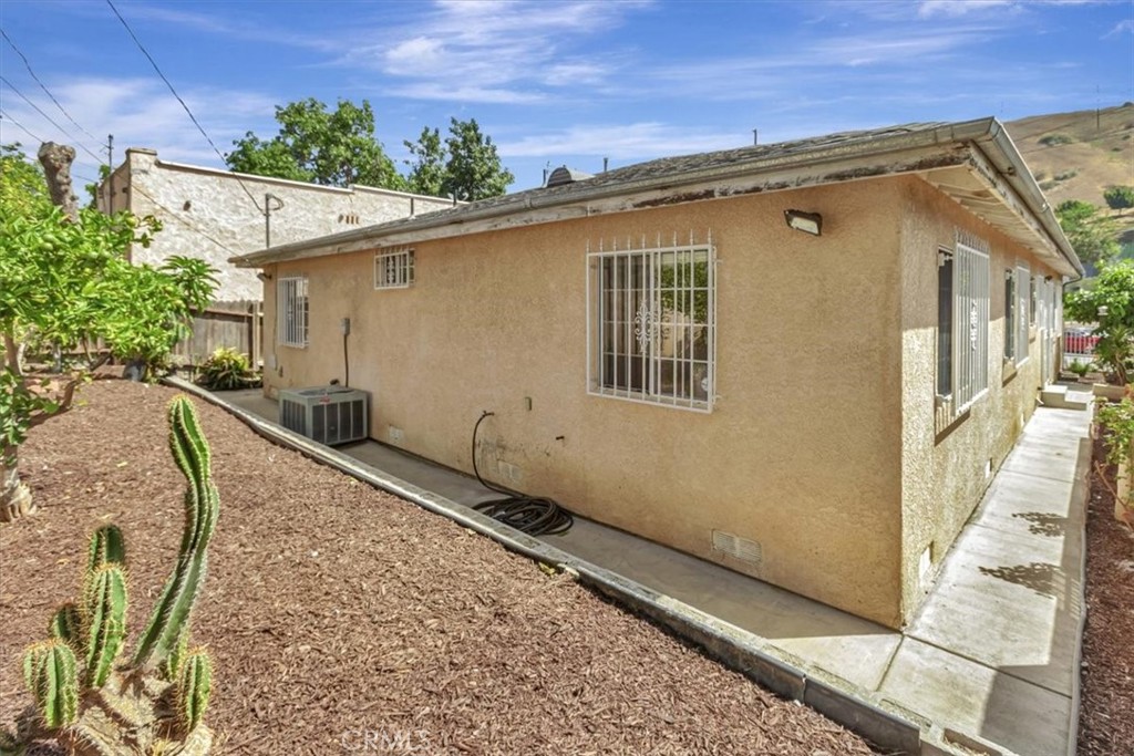4133 North Mission Road Los Angeles, CA 90032 - Photo 24 of 40 a view of a house with a backyard