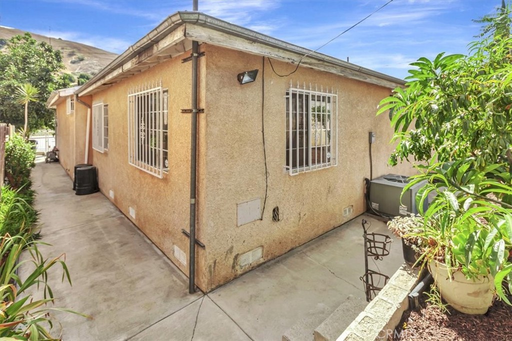 4133 North Mission Road Los Angeles, CA 90032 - Photo 26 of 40 a view of a house with backyard
