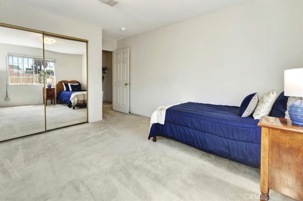 4133 North Mission Road Los Angeles, CA 90032 - Photo 8 of 40 a bed room with a bed and a dresser