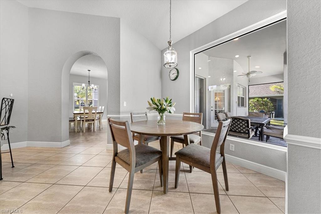 297 Sawgrass Court Naples, FL 34110 - Photo 11 of 31 a dining room well furnished