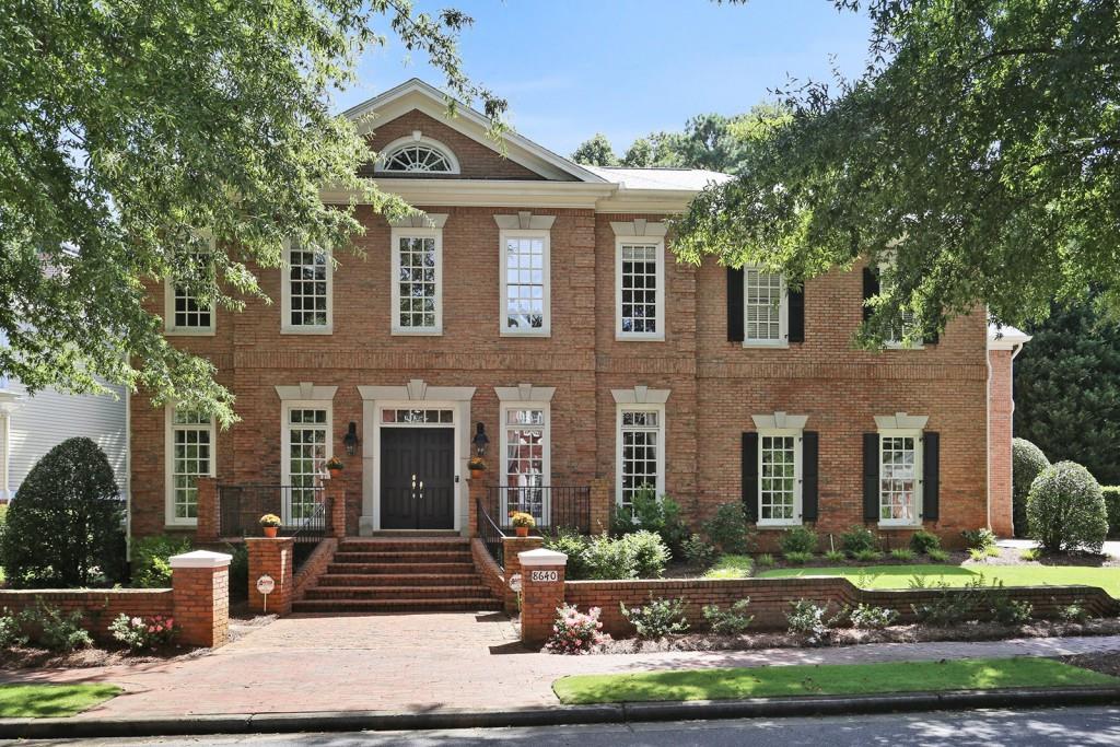 This well-appointed stately all brick residence is located in the prestigious gated community of Ellard. You are warmly greeted by the grand curb appeal of this home. Flaring wide brick steps lead you to a brick front porch with iron railing & a classic black double front entry door. 