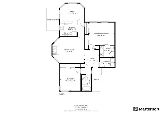 a sign of golf club on a red brick wall