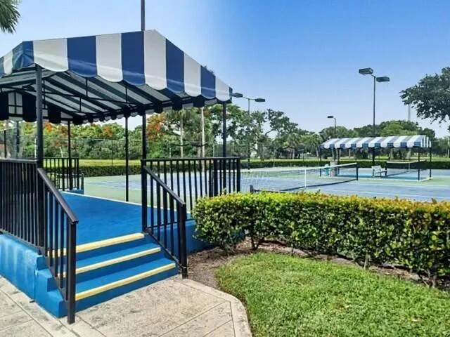 a view of a golf course with a lake