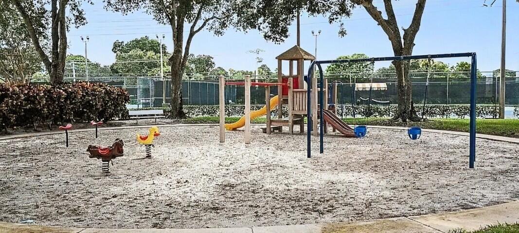 2791 Village Boulevard, Unit 105 West Palm Beach, FL 33409 - Photo 15 of 16 a view of park with slide