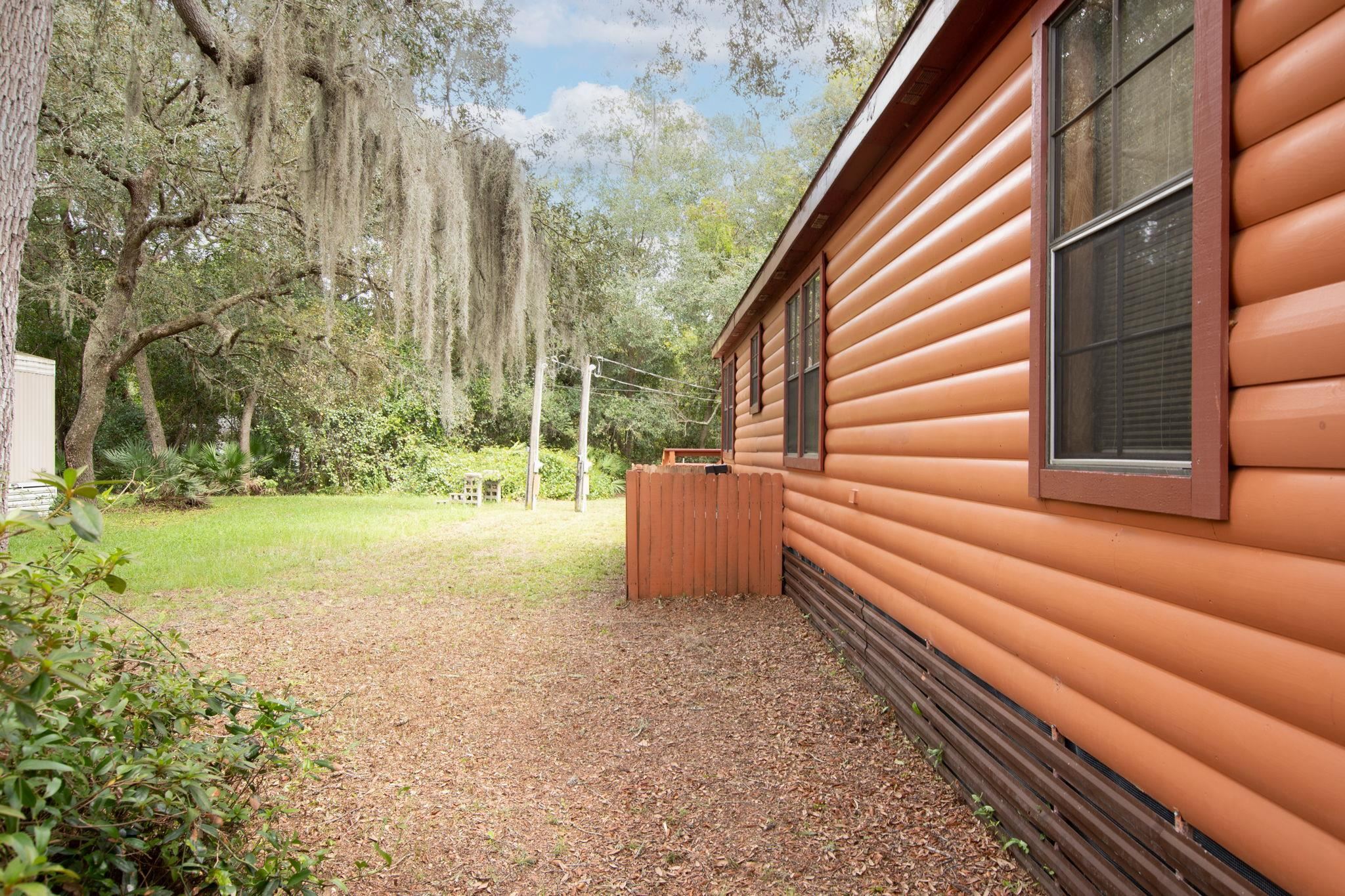 890 Kings Estate Road St. Augustine, FL 32086 - Photo 15 of 38 a view of backyard with seating space