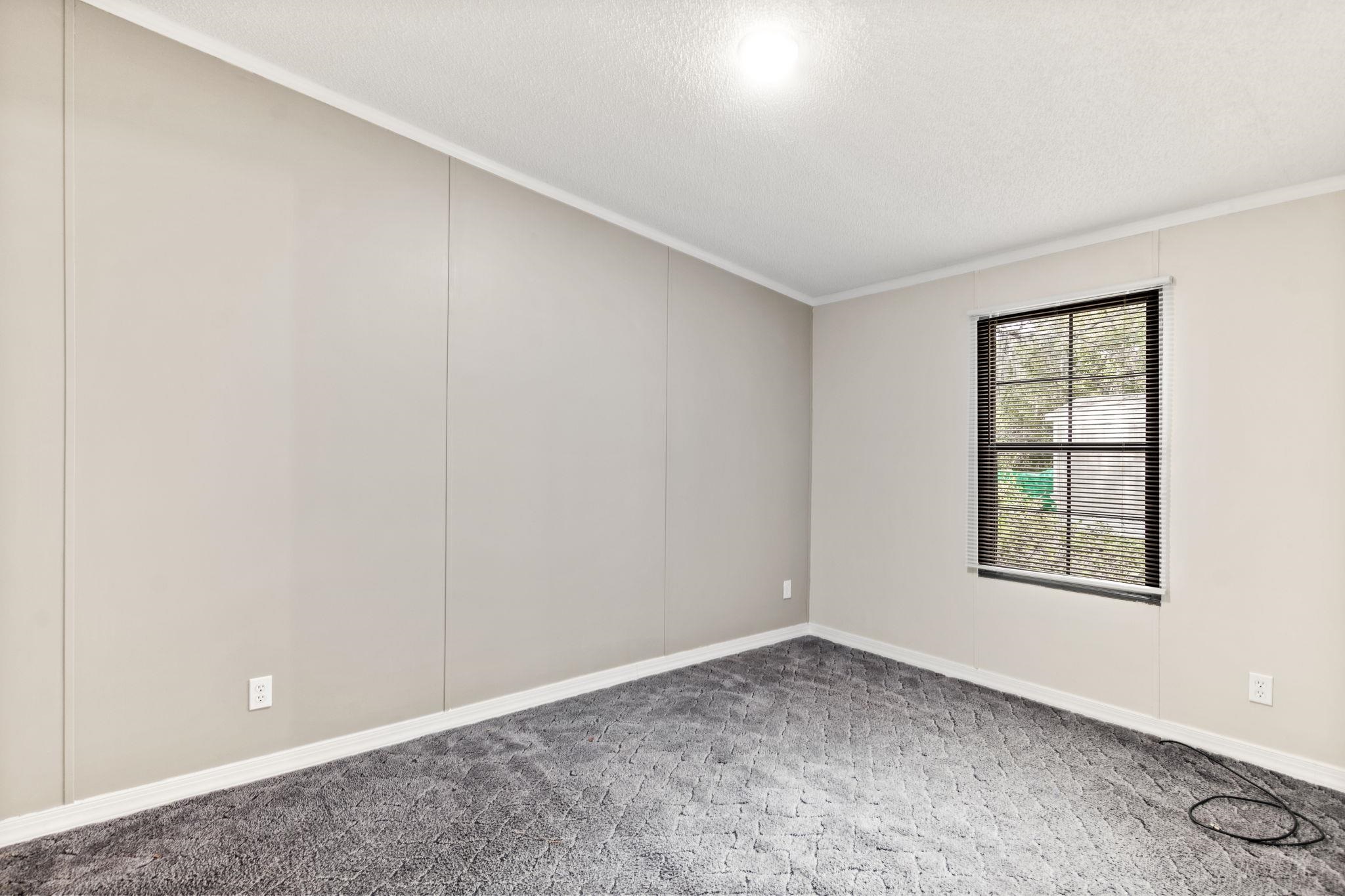 890 Kings Estate Road St. Augustine, FL 32086 - Photo 21 of 38 an empty room with windows and closet
