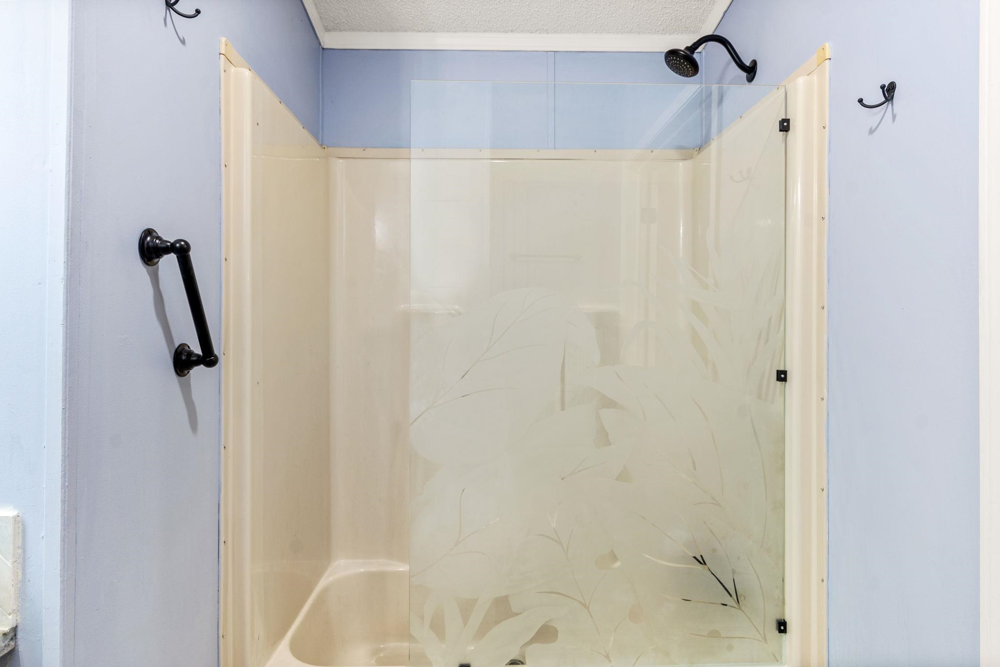 890 Kings Estate Road St. Augustine, FL 32086 - Photo 25 of 38 a bathroom with a shower
