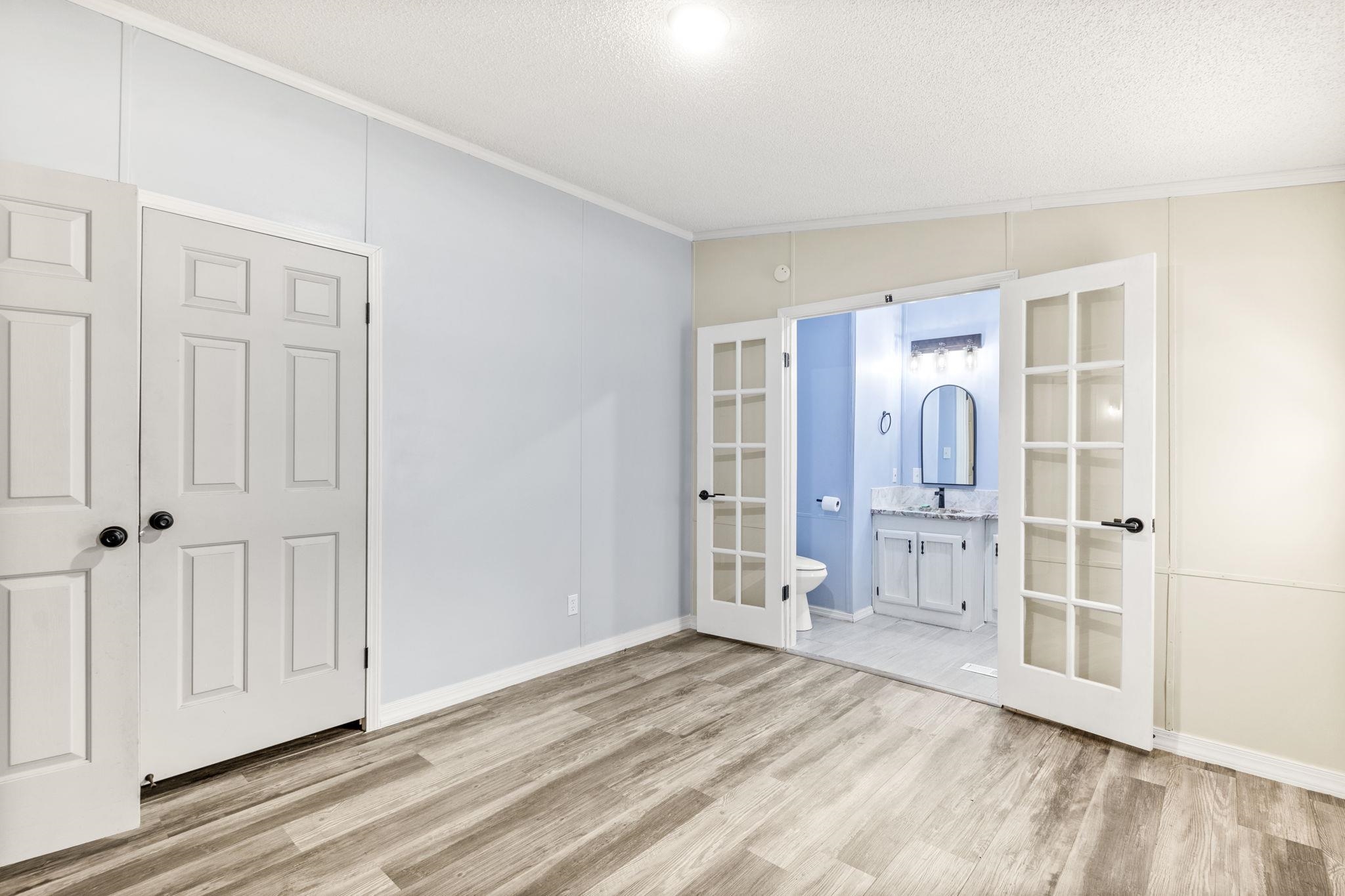 890 Kings Estate Road St. Augustine, FL 32086 - Photo 30 of 38 a view of empty room with wooden floor