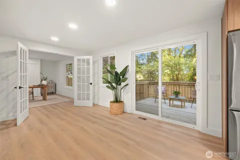 a bedroom with furniture and a window