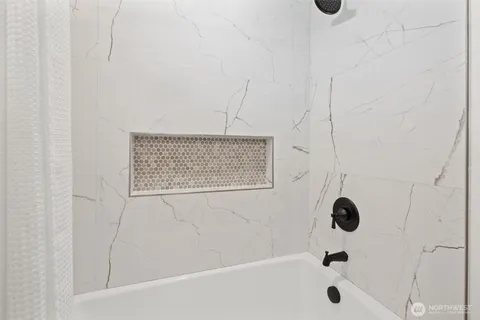 a bathroom with a bathtub