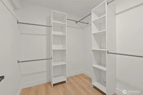 a view of an empty walk in closet