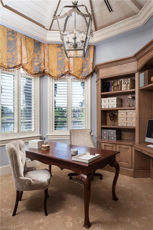 2152 Canna Way Naples, FL 34105 - Photo 17 of 25 a workspace with furniture window and a chandelier