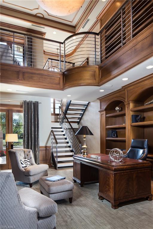 2152 Canna Way Naples, FL 34105 - Photo 22 of 25 a living room with furniture and wooden floor