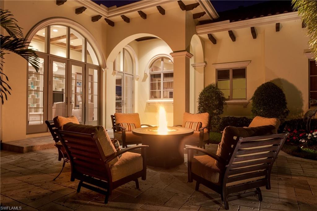 2152 Canna Way Naples, FL 34105 - Photo 25 of 25 a living room with furniture and wooden floor