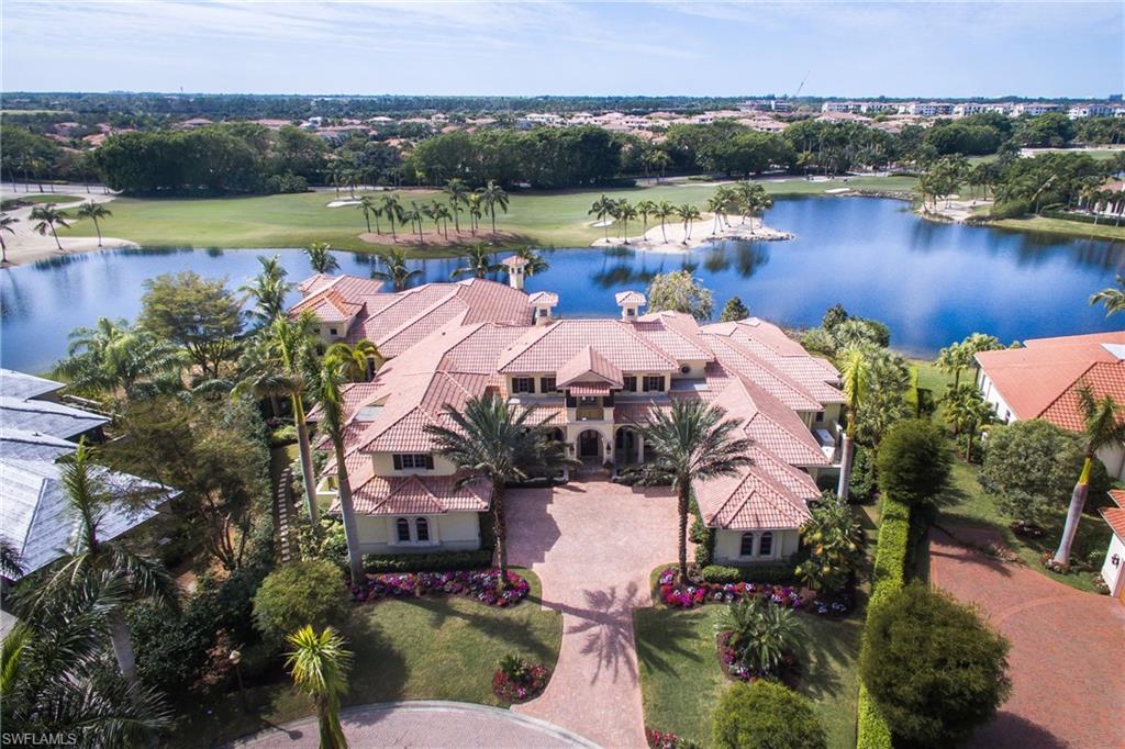 2152 Canna Way Naples, FL 34105 - Photo 4 of 25 an aerial view of a house with a lake view and a mountain view