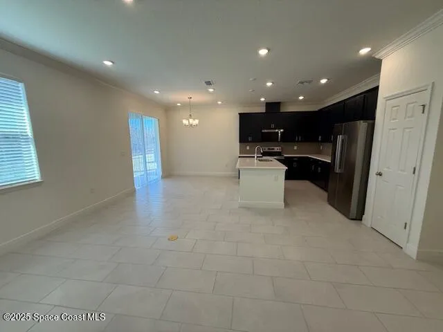 a view of a electric appliances in kitchen and entryway