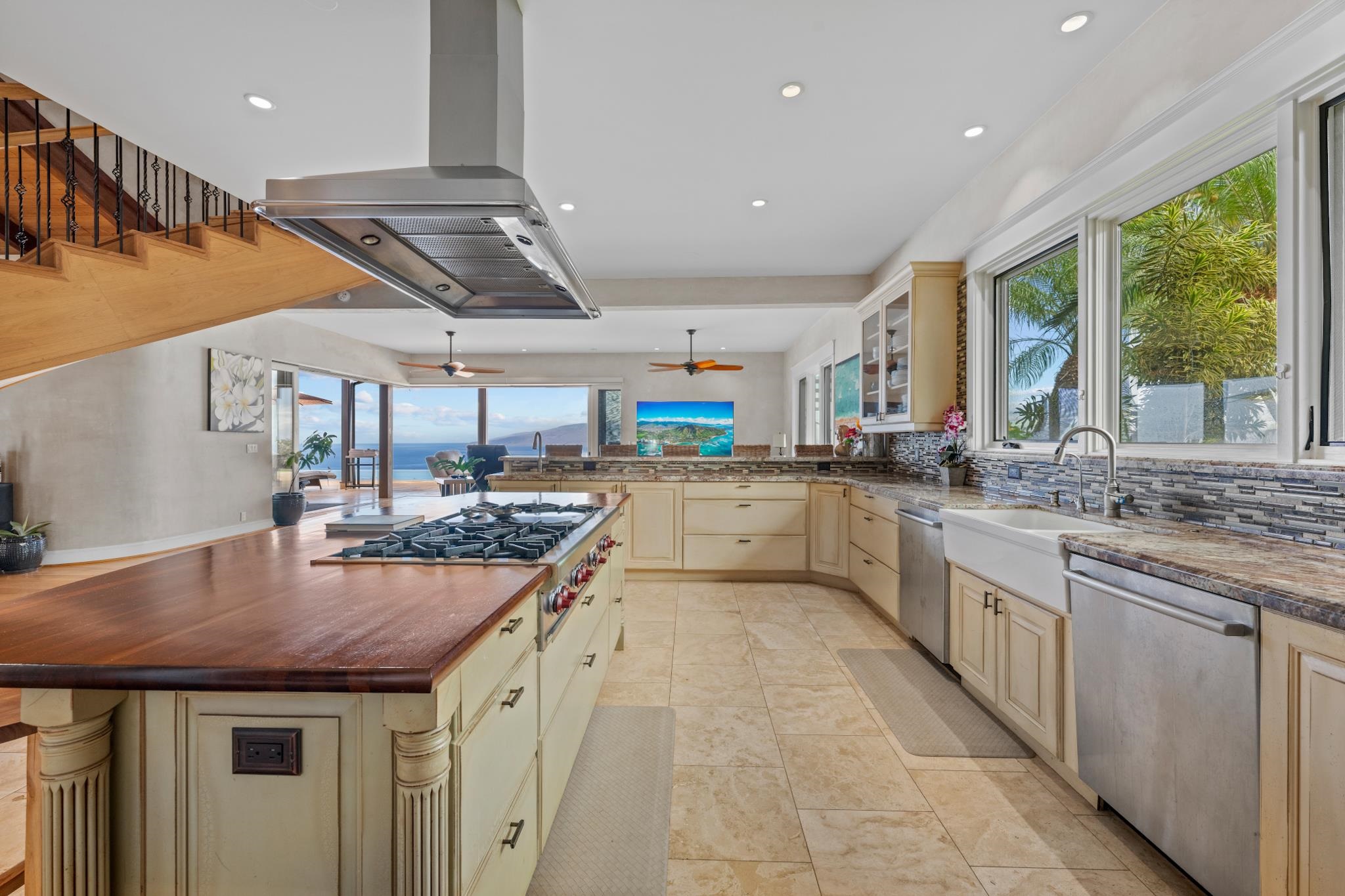 554 Punakea Loop, Unit A Lahaina, HI 96761 - Photo 19 of 49 a kitchen with stainless steel appliances granite countertop a sink and cabinets
