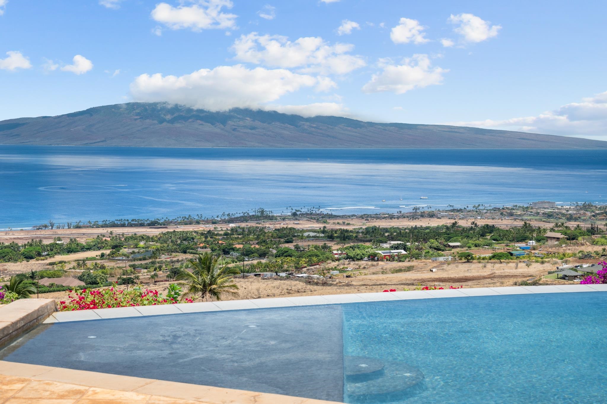 554 Punakea Loop, Unit A Lahaina, HI 96761 - Photo 2 of 49 a view of a city