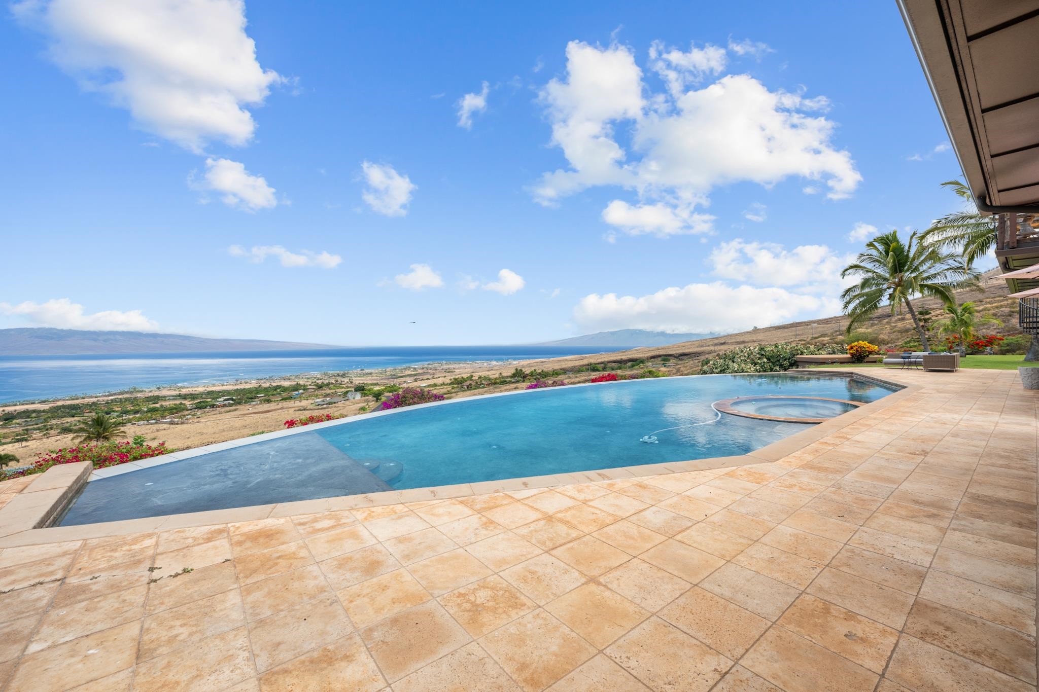 554 Punakea Loop, Unit A Lahaina, HI 96761 - Photo 24 of 49 a view of an ocean and beach
