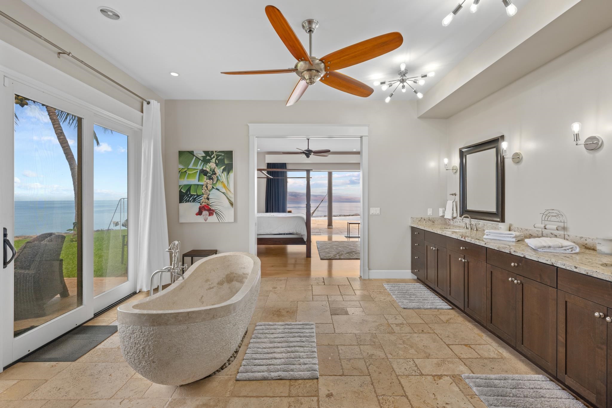 554 Punakea Loop, Unit A Lahaina, HI 96761 - Photo 28 of 49 a large spacious bathroom with a large tub and sink