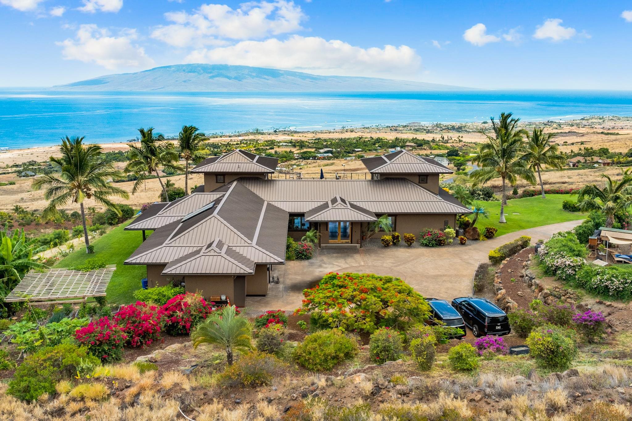 554 Punakea Loop, Unit A Lahaina, HI 96761 - Photo 3 of 49 a aerial view of a house with a ocean view