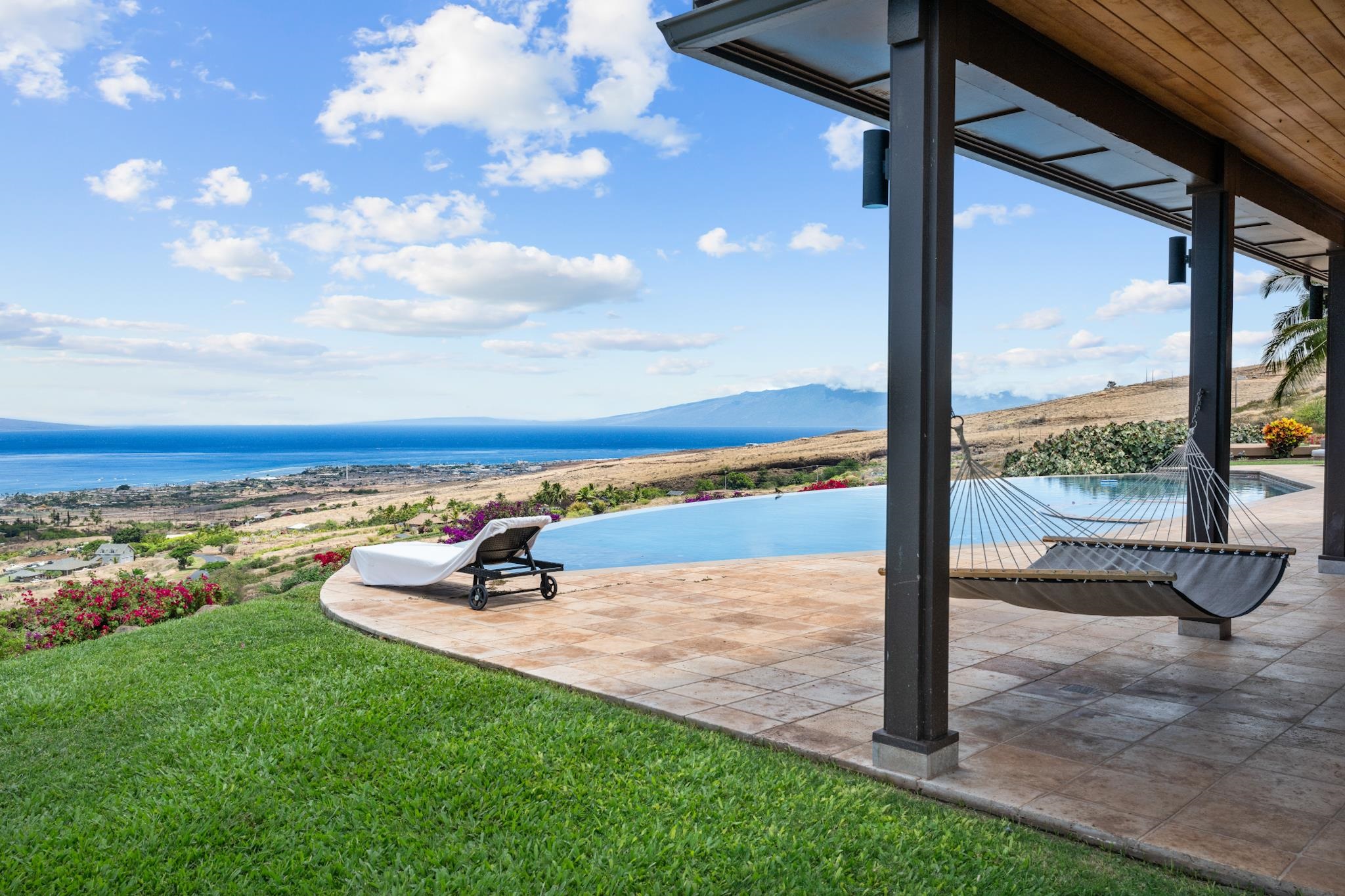 554 Punakea Loop, Unit A Lahaina, HI 96761 - Photo 33 of 49 a view of swimming pool from a yard