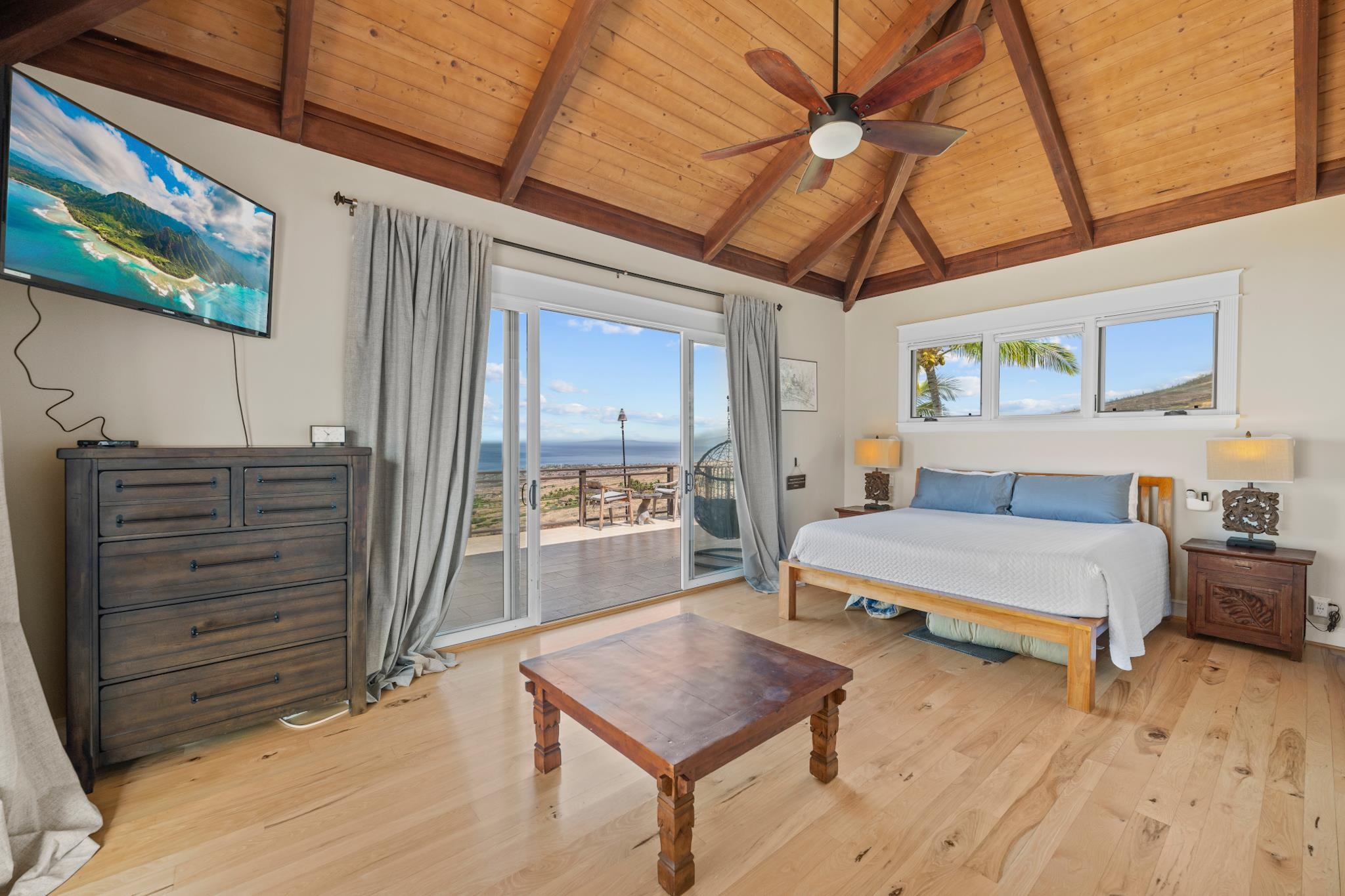 554 Punakea Loop, Unit A Lahaina, HI 96761 - Photo 35 of 49 a bedroom with furniture and window