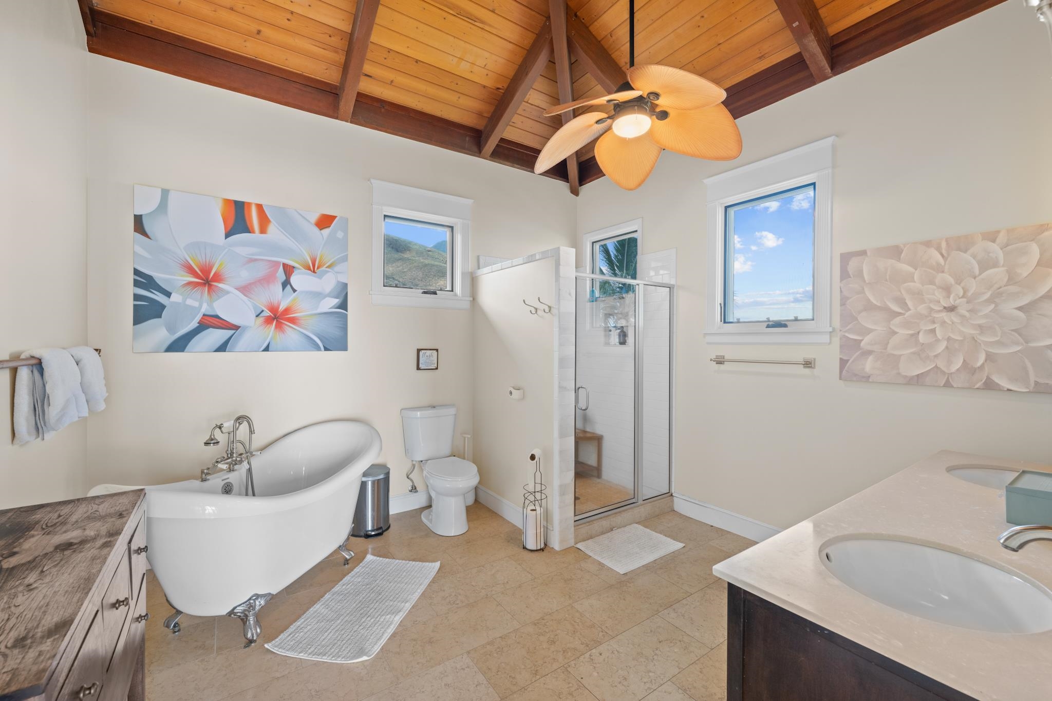554 Punakea Loop, Unit A Lahaina, HI 96761 - Photo 37 of 49 a bathroom with a sink a toilet and shower