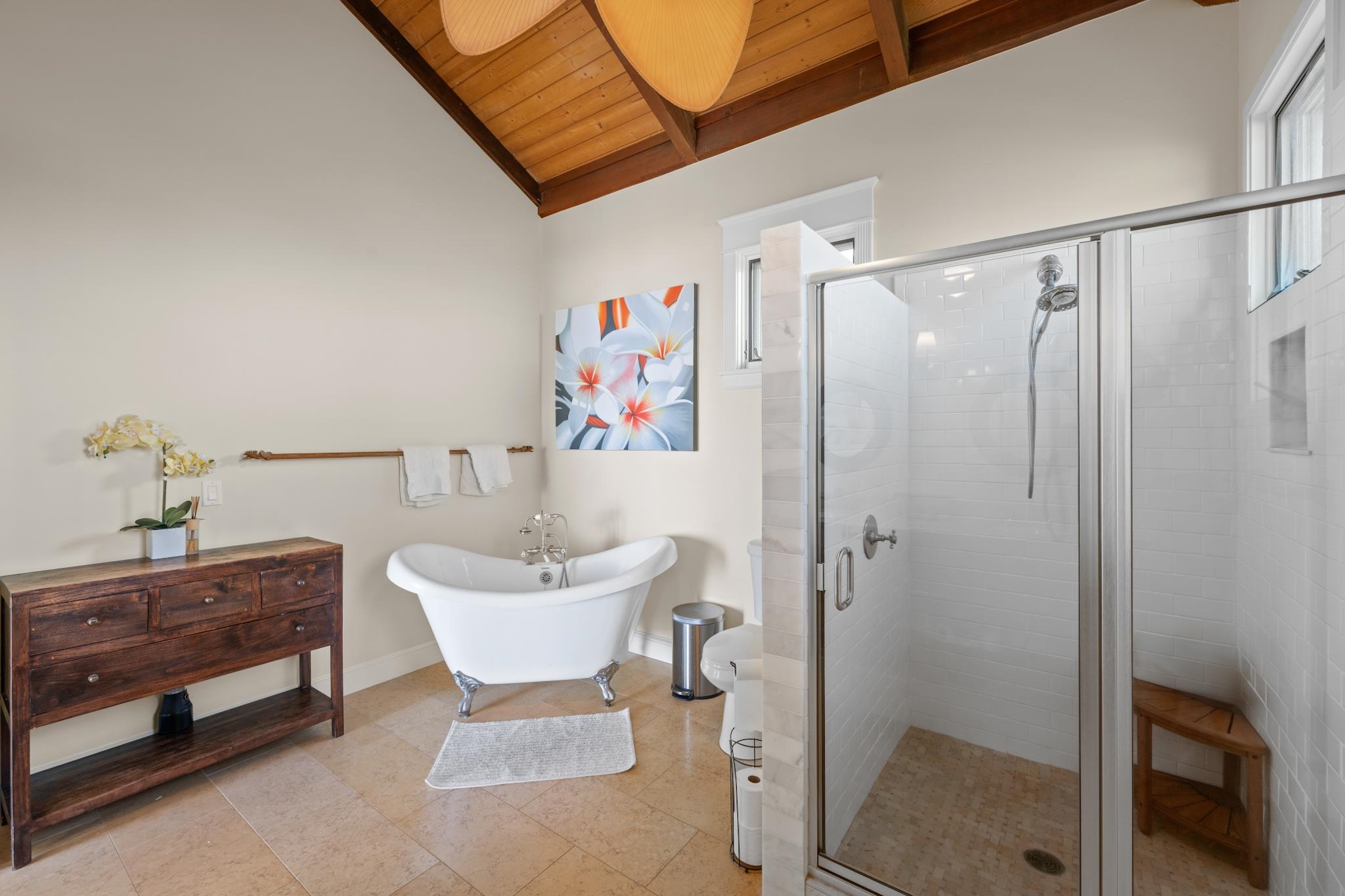 554 Punakea Loop, Unit A Lahaina, HI 96761 - Photo 38 of 49 a bathroom with a sink a mirror and a shower