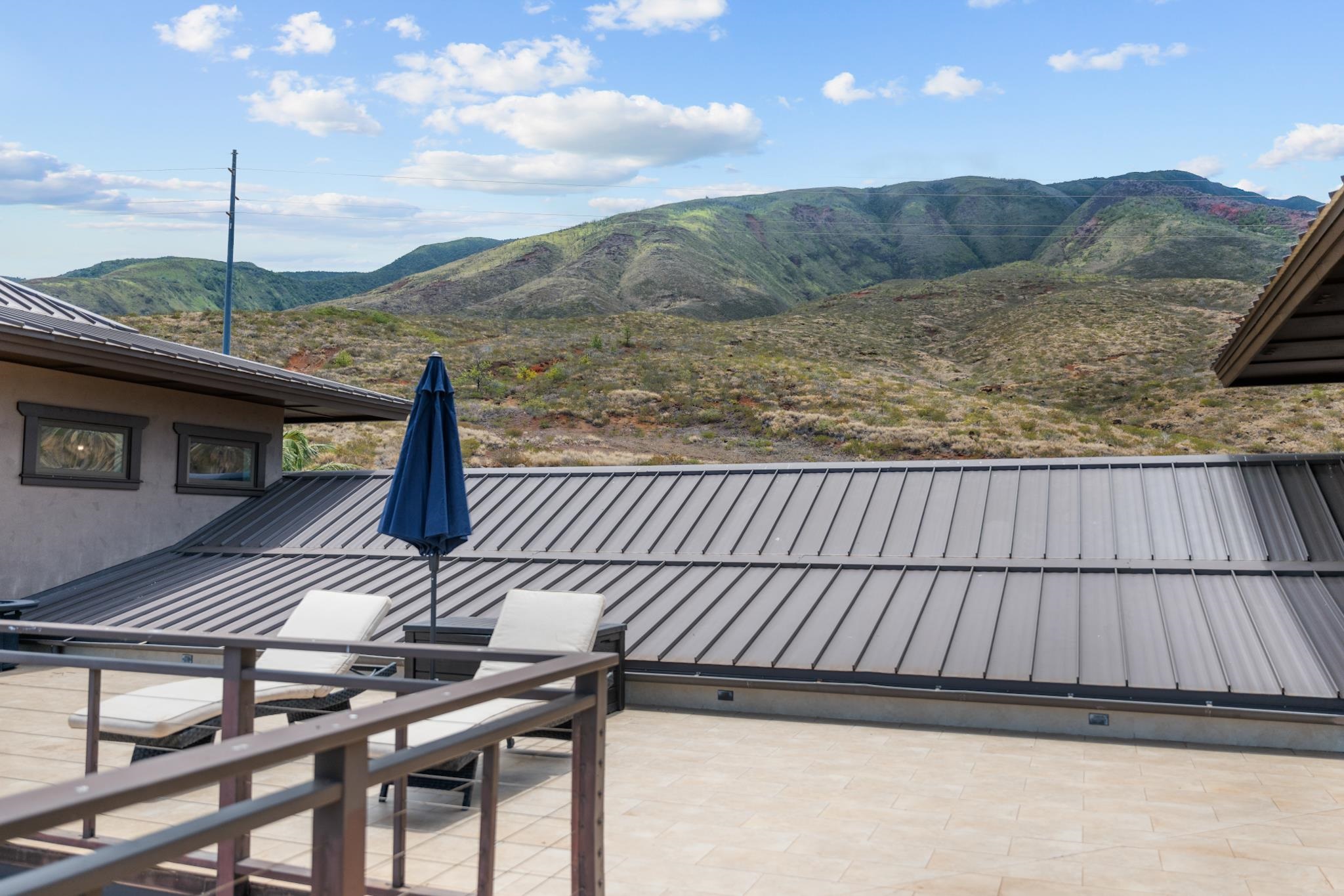 554 Punakea Loop, Unit A Lahaina, HI 96761 - Photo 45 of 49 a view of a balcony with an outdoor space